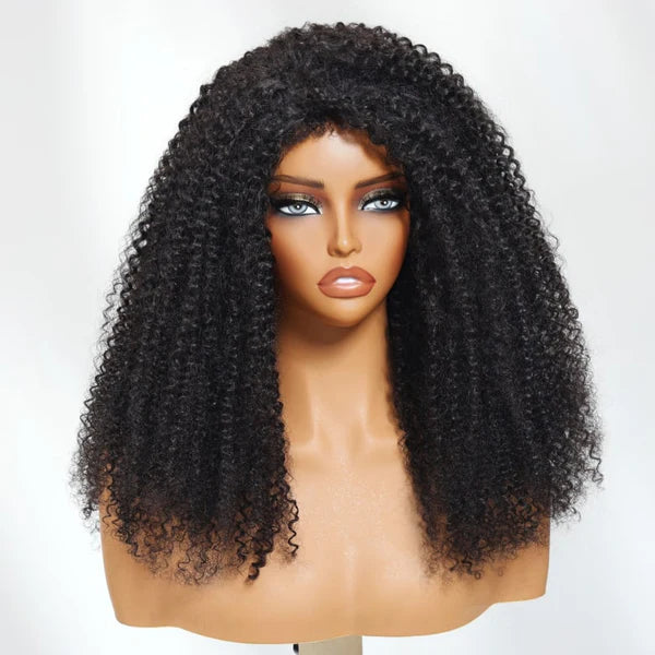 Mannequin head with a black curly wig on a white background